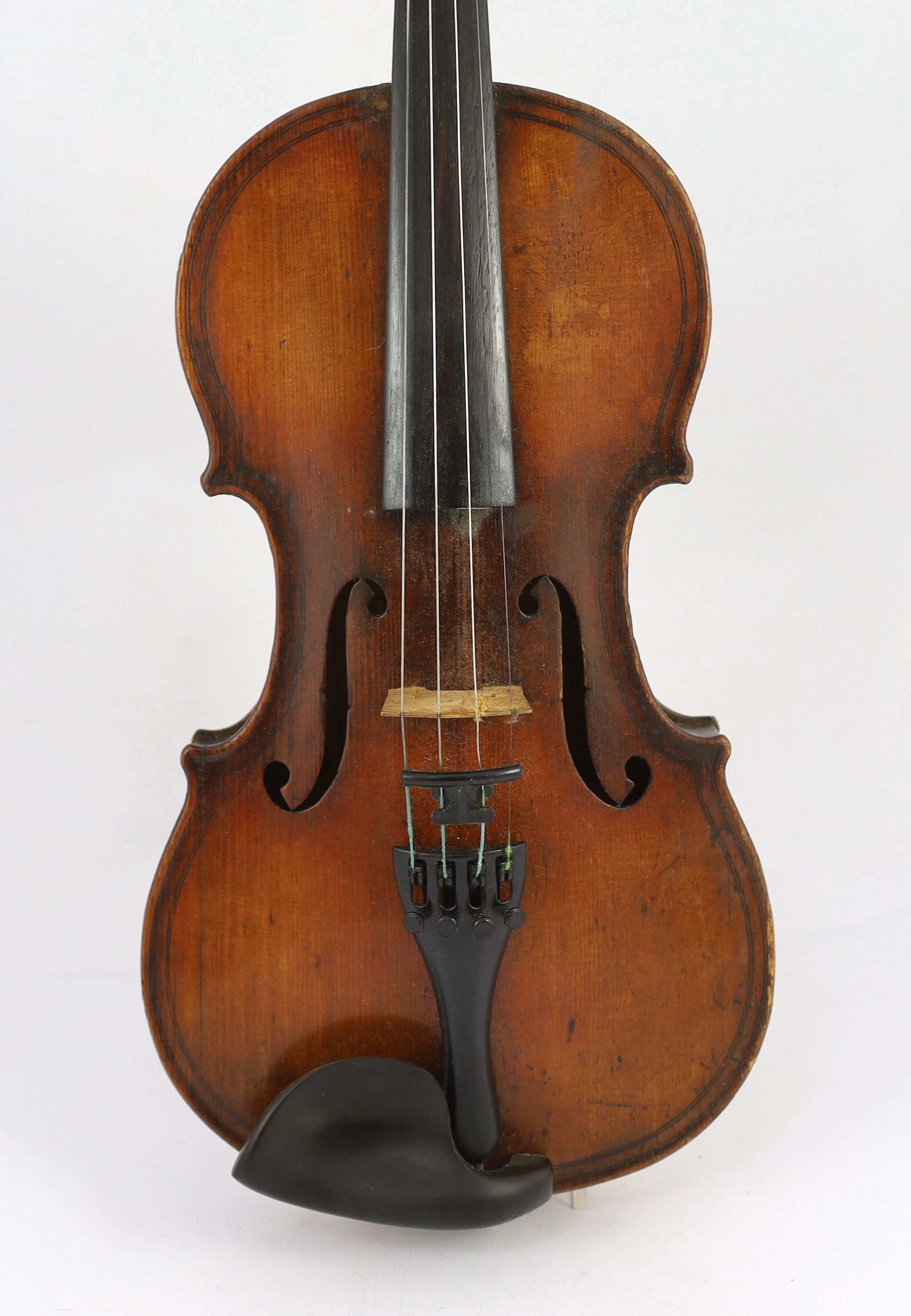 An 18th century violin, labelled ‘New Back by James Carroll, Maker, Manchester 1899’, length of back 36.5cm